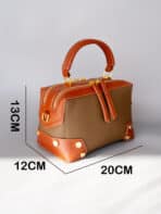 Bolsa Feminina Couro Premium Mini Baú Elegante Compacta Alça Larga - Imagem 9
